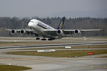 white Singapore Airlines airplane thumbnail