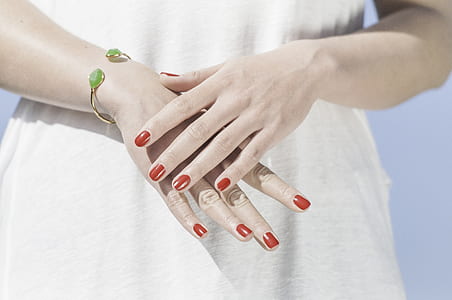 woman wearing gold-colored cuff bracelet thumbnail