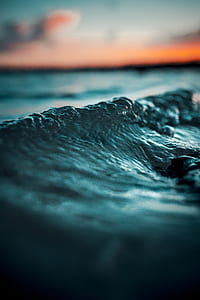 selective focus photography of sea waves thumbnail