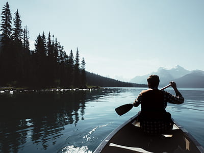 man paddling paddle riding boat thumbnail