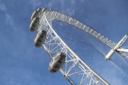 low angle photo of white ferris wheel at daytime thumbnail