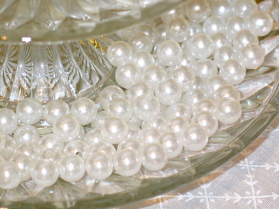 closeup photo of pearls in bowl thumbnail