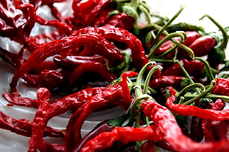 dried red chili peppers in plate thumbnail