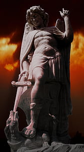 gray concrete sculpture on black and orange background thumbnail