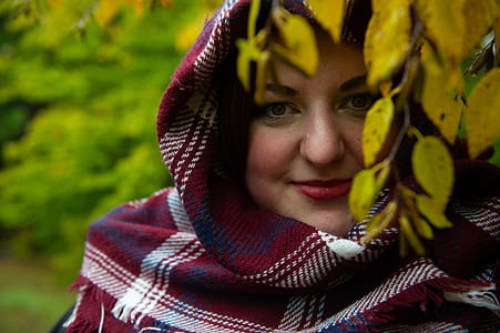 Woman Wearing Red and White Plaid Headscarf thumbnail