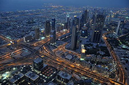 aerial view of city buildings at night thumbnail