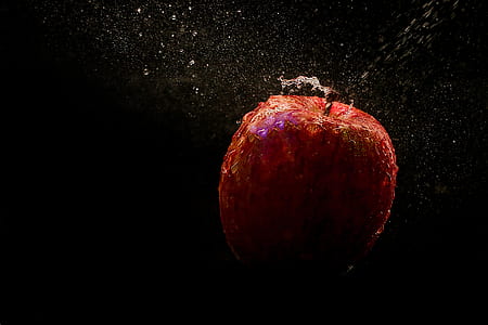 Time Lapse Photography Of Falling Red Apple thumbnail