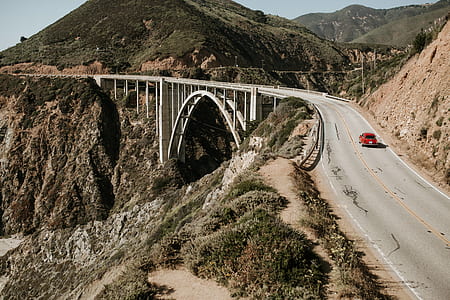 red on gray asphalt road thumbnail
