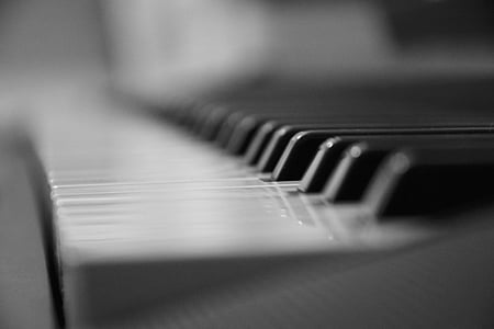 selective focus photo of piano keyboard thumbnail