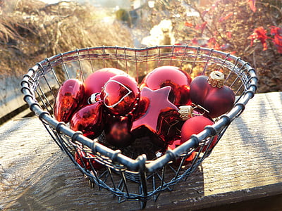 red Christmas baubles in gray wire heart bowl thumbnail