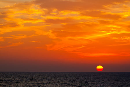 calm body of water during sunset thumbnail