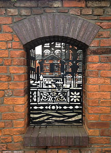 Original archway with modern ironwork detailing, canal Basin, Ducie Street, Manchester. thumbnail
