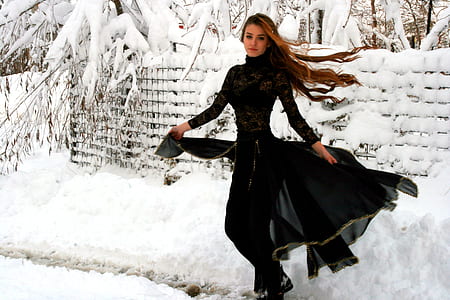 woman in black abaya dress on thumbnail
