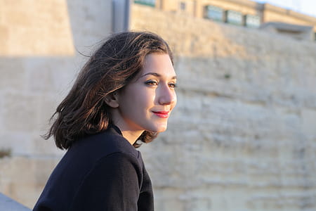 Woman Wears Black Coat and Red Lipstick thumbnail