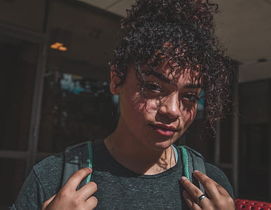 woman carrying backpack thumbnail