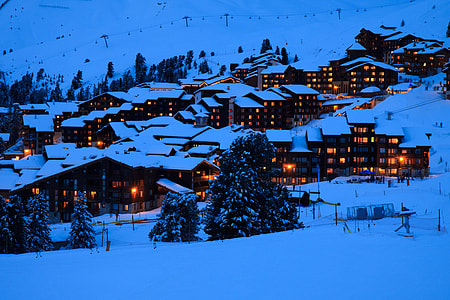 photo of snow covered town with lights thumbnail