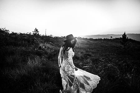 woman standing surrounding plants thumbnail