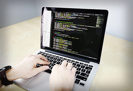 person using MacBook Pro thumbnail