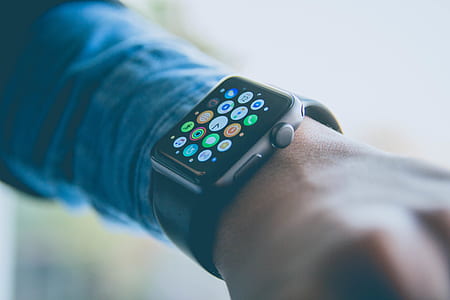person using space gray aluminum case Apple Watch with black Sport Band thumbnail