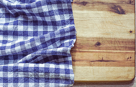 white and blue plaid cloth on brown surfacew thumbnail