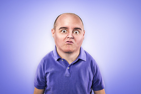 man wearing purple polo shirt thumbnail