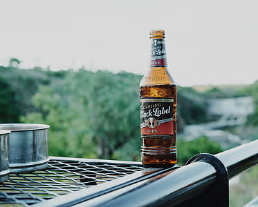 glass bottle on gray rails thumbnail