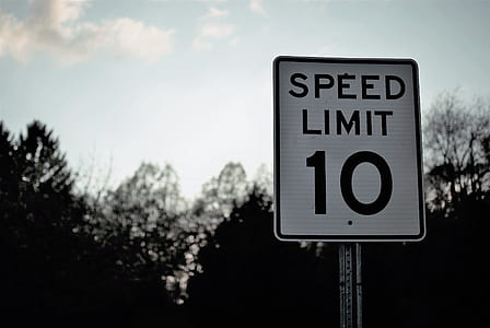 white and black speed limit 10 road sign thumbnail