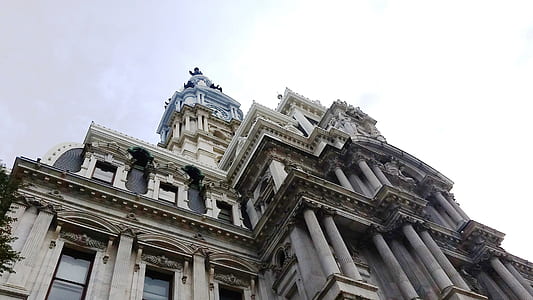 low-angle photography of gray concrete building thumbnail