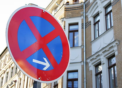 low-angle photography of red and white road signage thumbnail