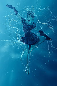 female wearing black dress performing stunt dance thumbnail