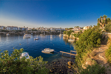 aerial photo of boats on calm body of water thumbnail