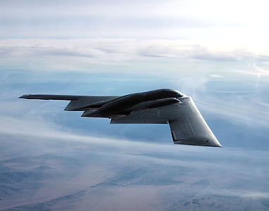 black jet fighter plane on mid air at daytime thumbnail