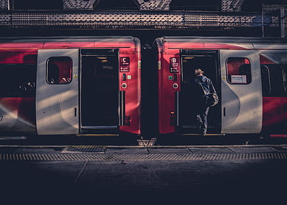 person riding red train thumbnail