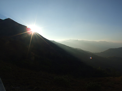 silhouette of mountain during daytime thumbnail
