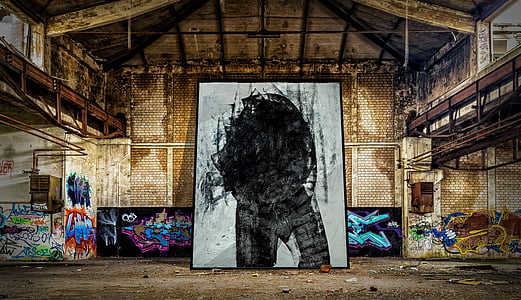 black abstract painting on brown soil thumbnail