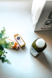 three prescription bottles on beside box thumbnail