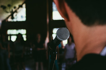 man near microphone thumbnail