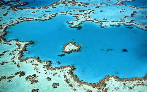 aerial photo of an island during daytime thumbnail