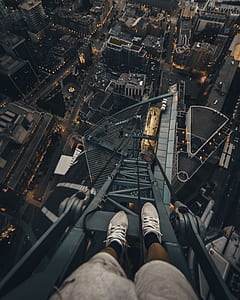 person standing in tower during daytime thumbnail