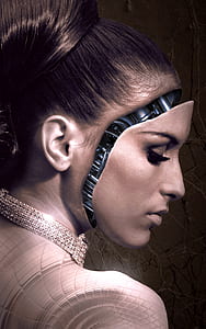 woman with robot face wearing gold-colored necklace thumbnail