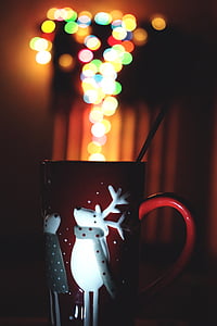 selective focus photography of white and red ceramic mug thumbnail