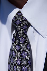 close-up photography of multicolored argyle necktie thumbnail