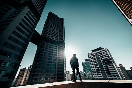 person standing on top of building thumbnail