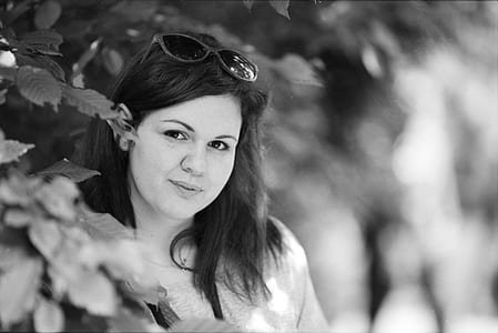gray scale photo of woman smiling thumbnail