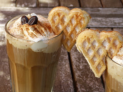 clear drinking glass filled by mocha thumbnail