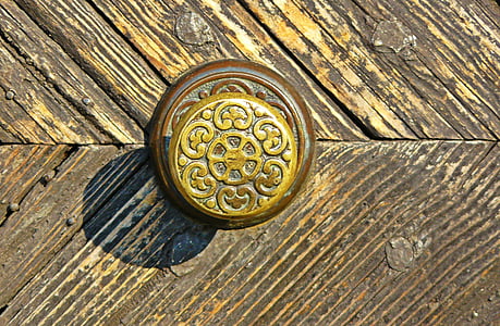 round brown floral decor on brown wooden board thumbnail