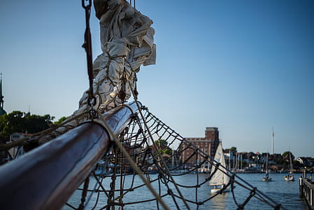 white boat sailing thumbnail
