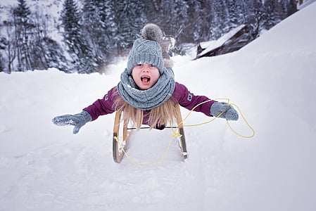 child on sleigh thumbnail