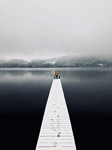 man standing on boardwalk thumbnail