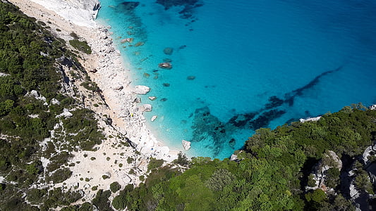 bird's eye view photography of island and sea thumbnail